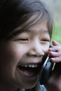 Child talking on cell phone Royalty Free Stock Photo