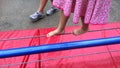 Child tightrope walker walking on Tightrope