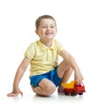 Child with toy isolated on a white background Royalty Free Stock Photo