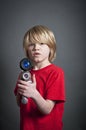 Child with toy laser gun