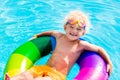 Child with toy ring in swimming pool Royalty Free Stock Photo