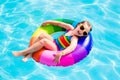 Child with toy ring in swimming pool Royalty Free Stock Photo