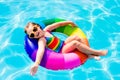 Child with toy ring in swimming pool Royalty Free Stock Photo