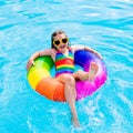 Child with toy ring in swimming pool Royalty Free Stock Photo