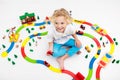 Child with toy train. Kids wooden railway Royalty Free Stock Photo