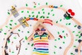Child with toy train. Kids wooden railway. Royalty Free Stock Photo