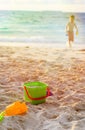 Child toys on sunset beach Royalty Free Stock Photo