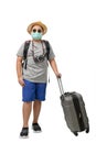 Child traveler wear surgical mask with suitcase