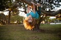 Child on a tree. Insurance kids. Health care insurance concept for kids. Medical healthcare protection. Kid playing