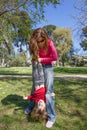 Child upside down hanging from mother hands