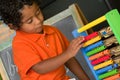 Child Using Abacus