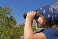 Child using binoculars Royalty Free Stock Photo