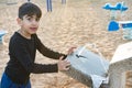 A child is using a dirty water tap Royalty Free Stock Photo