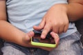 Child using mobile smart phone Royalty Free Stock Photo