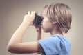 Child using new Virtual Reality, VR cardboard glasses Royalty Free Stock Photo