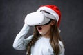 Child using virtual reality headset, surprised kid looking in VR glasses Royalty Free Stock Photo