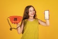 child with vintage and modern telephone. childhood development. pretty teenage girl in dress talk on phone. kid speak on Royalty Free Stock Photo