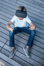 Child with virtual reality glasses