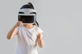 Child with Virtual Reality, VR, Headset Studio Shot Isolated on White Background. Kid Exploring Digital Virtual World with VR