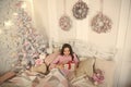 Child waiting christmas in bedroom. Kid lay in bed relaxing. Home is the best place in the world. Girl little kid Royalty Free Stock Photo