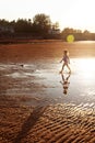 Child walking on beach Royalty Free Stock Photo