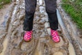 child walking in mud