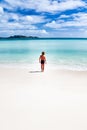 Child walking on a tropical beach