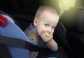 The child was rocked in a car seat. The boy suffers from kinetosis and motion sickness. The concept of motion sickness and
