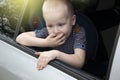 The child was rocked in a car seat. The boy suffers from kinetosis and motion sickness. The concept of motion sickness and