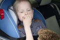 The child was rocked in a car seat. The boy suffers from kinetosis and motion sickness. The concept of motion sickness and