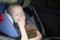 The child was rocked in a car seat. The boy suffers from kinetosis and motion sickness. The concept of motion sickness and