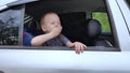 The child was rocked in a car seat. The boy suffers from kinetosis and motion sickness. The concept of motion sickness and