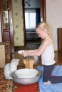 child washes a soft toy with soap in a basin Royalty Free Stock Photo