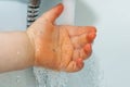 Child washing his hands Royalty Free Stock Photo