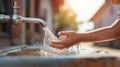 A child washing their hands with water from a faucet, AI