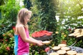 Child watching butterfly at tropical garden Royalty Free Stock Photo