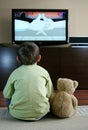 Child watching TV Royalty Free Stock Photo