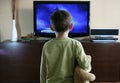 Child watching TV Royalty Free Stock Photo