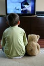 Child watching TV Royalty Free Stock Photo