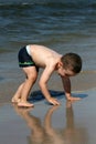 Child, water and fun. Beach fun. Royalty Free Stock Photo