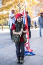 A Child Waves a Trump Flag at a Stop the Steal Rally