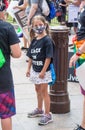 A Child Wearing a Mask Attends a Black Lives Matter Protest