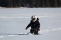 Child Wearing an OHV Stepping Through Deep Snow Royalty Free Stock Photo