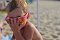 Child wearing pink sunglasses Royalty Free Stock Photo