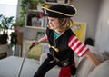 Child wearing pirate costume