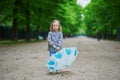 Child wearing rain boots with umbrella on a fall day Royalty Free Stock Photo