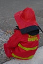 A child wears a firefighter costume