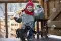 Child in the winter with animals. Royalty Free Stock Photo