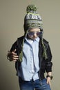 Child in winter cap.fashionable little boy in sunglasses.stylish kids Royalty Free Stock Photo