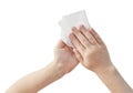 The child wipes, cleans his hands with a wet napkin isolate on a white Royalty Free Stock Photo